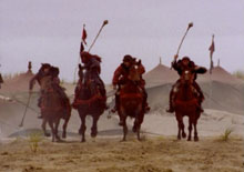 polo players thundering toward gabrielle